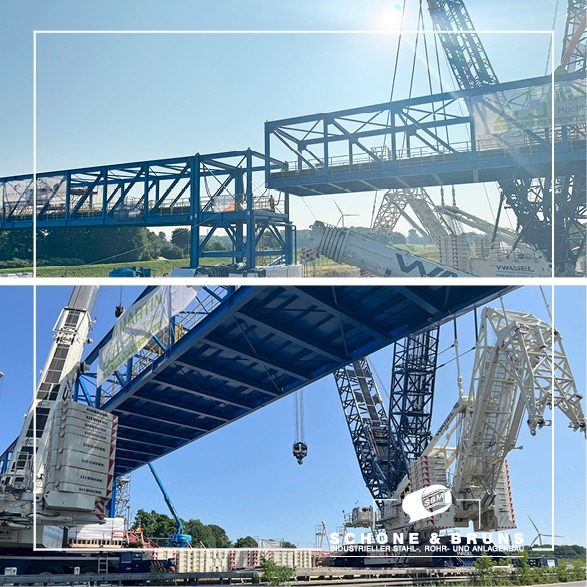 Eine Rohrbrücke wird über der Autobahn montiert. Im Hintergrund ist ein riesiger Raupenkran zu sehen.